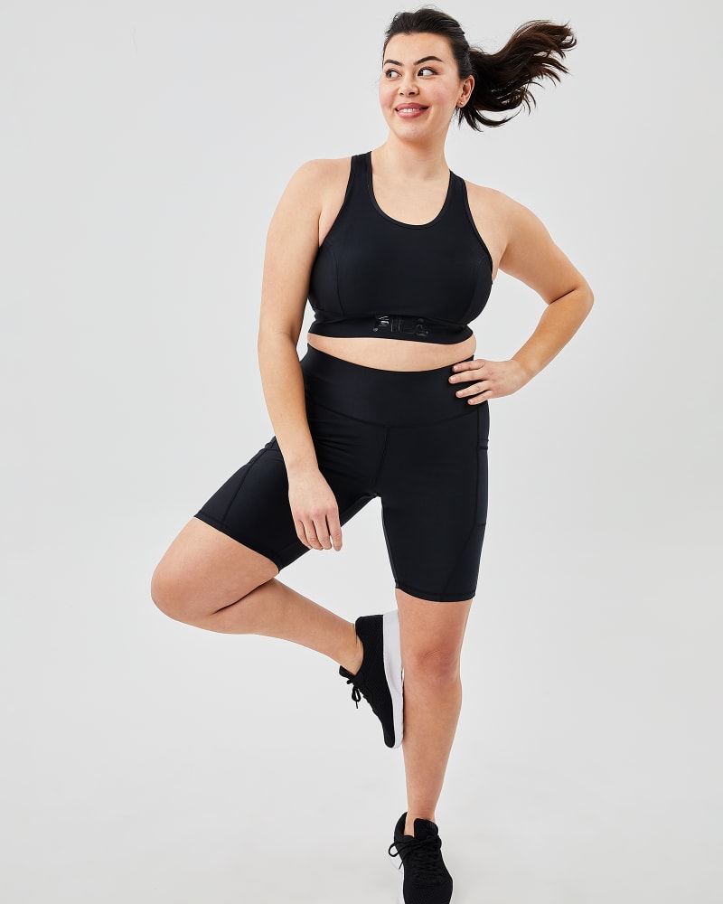Plus size model with rectangle body shape wearing Taneisha Bike Short by FILA | Dia&Co | dia_product_style_image_id:157950